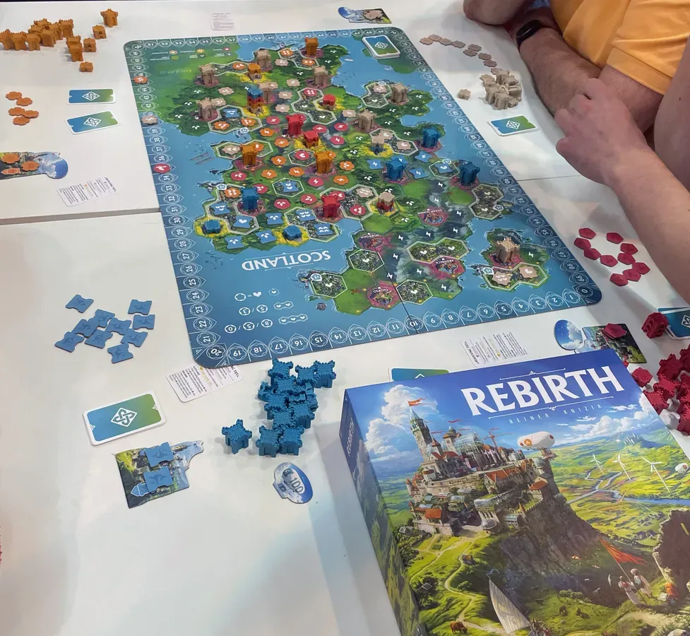 Board game box and game layout for the tabletop game Rebirth